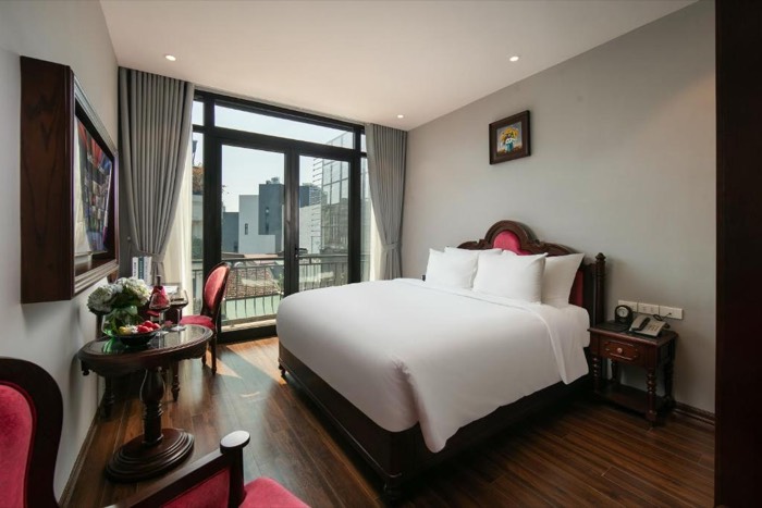 Guest room with balcony at Serene Central Hotel